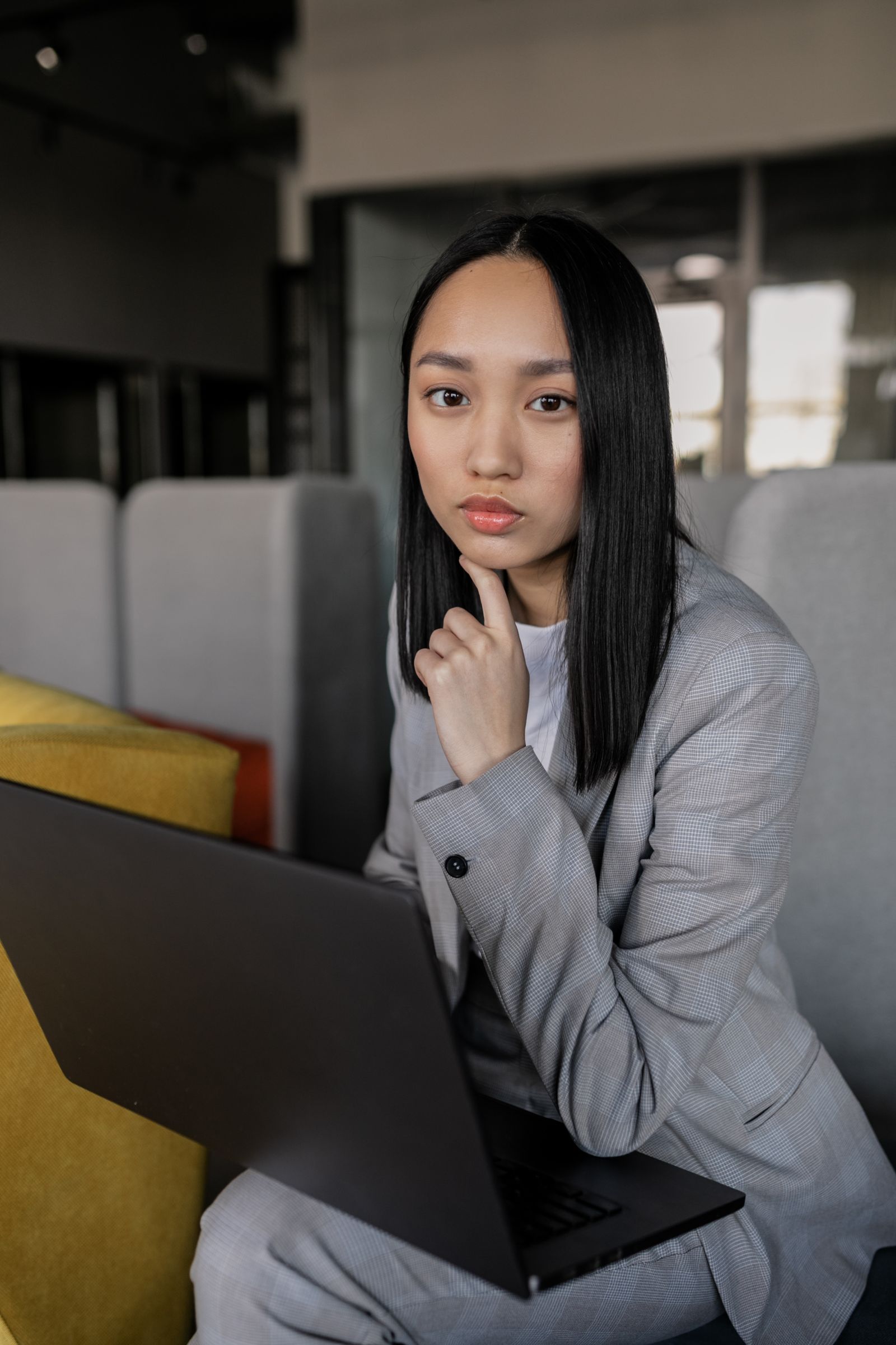 Business professional managing her company's cloud hosting